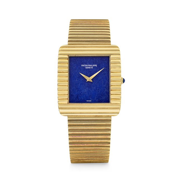 PATEK PHILIPPE. AN 18K GOLD BRACELET WATCH WITH LAPIS LAZULI DIAL REF. 3733⁄1, MOVEMENT NO. 1'329'779, CASE NO. 2'784'436, MANUFACTURED IN 1979
