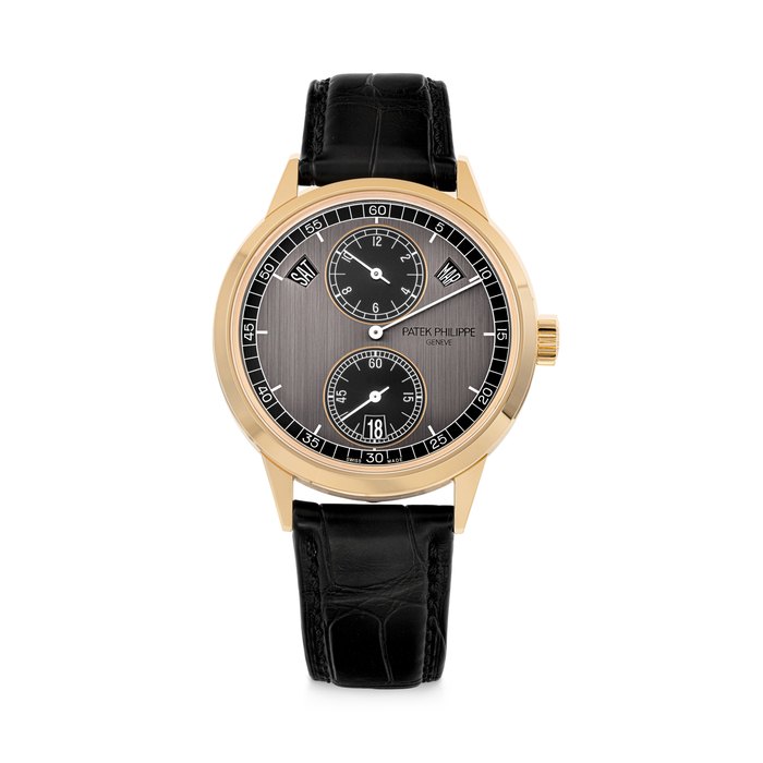 PATEK PHILIPPE. AN 18K PINK GOLD AUTOMATIC ANNUAL CALENDAR WRISTWATCH WITH REGULATOR-STYLE DIAL REF. 5235/50R-001, MOVEMENT NO. 7'231'115, CASE NO. 6'363'460, CIRCA 2019