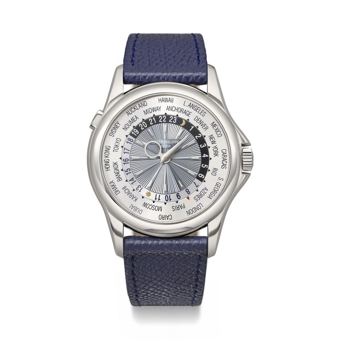 PATEK PHILIPPE. AN ATTRACTIVE AND COVETED PLATINUM AUTOMATIC WORLD TIME WRISTWATCH REF. 5130P-001, MOVEMENT NO. 3'671'370, CASE NO. 4'416'834, CIRCA 2008