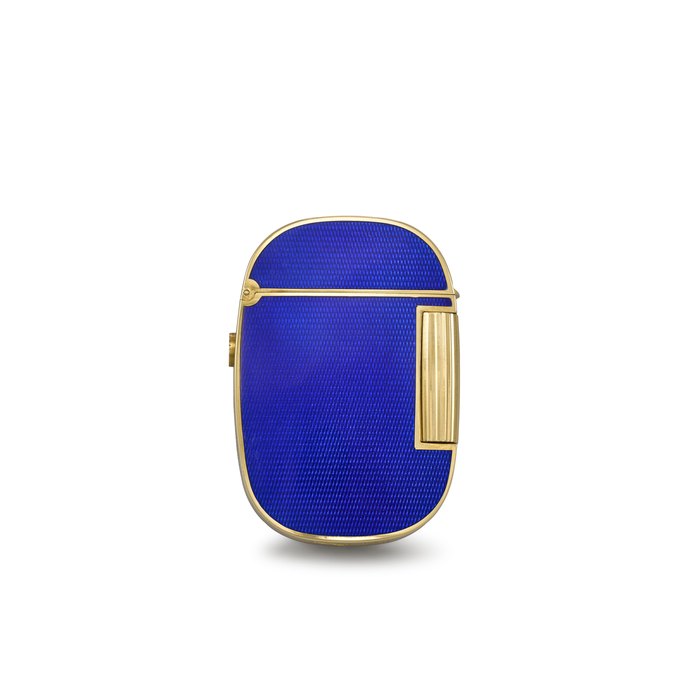 PATEK PHILIPPE. A RARE AND ATTRACTIVE 18K GOLD AND ENAMEL LIGHTER GOLDEN ELLIPSE LIGHTER MODEL, REF. 9507, CASE NO. A294, CIRCA 1980