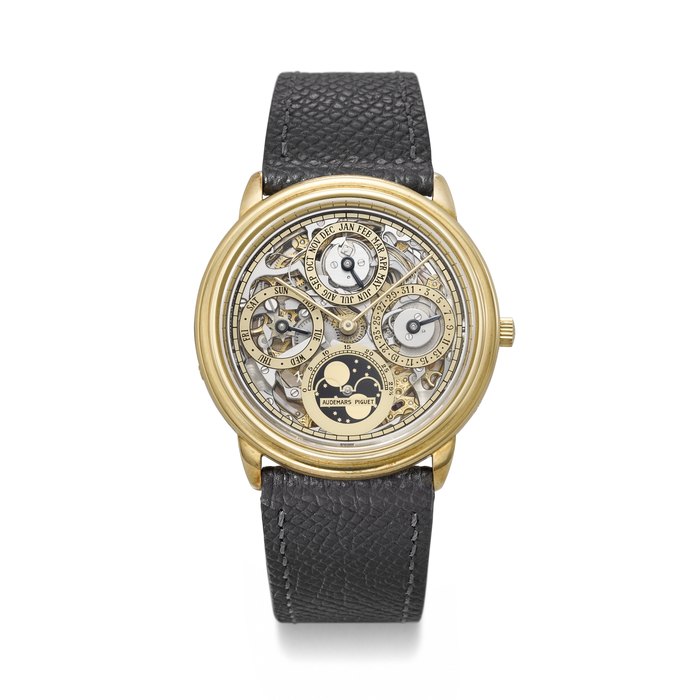 AUDEMARS PIGUET. A RARE AND ELEGANT 18K GOLD AUTOMATIC SKELETONIZED PERPETUAL CALENDAR WRISTWATCH WITH MOON PHASES QUANTIEME PERPETUEL MODEL, REF. 25668BA, NO. 213, CIRCA 1993