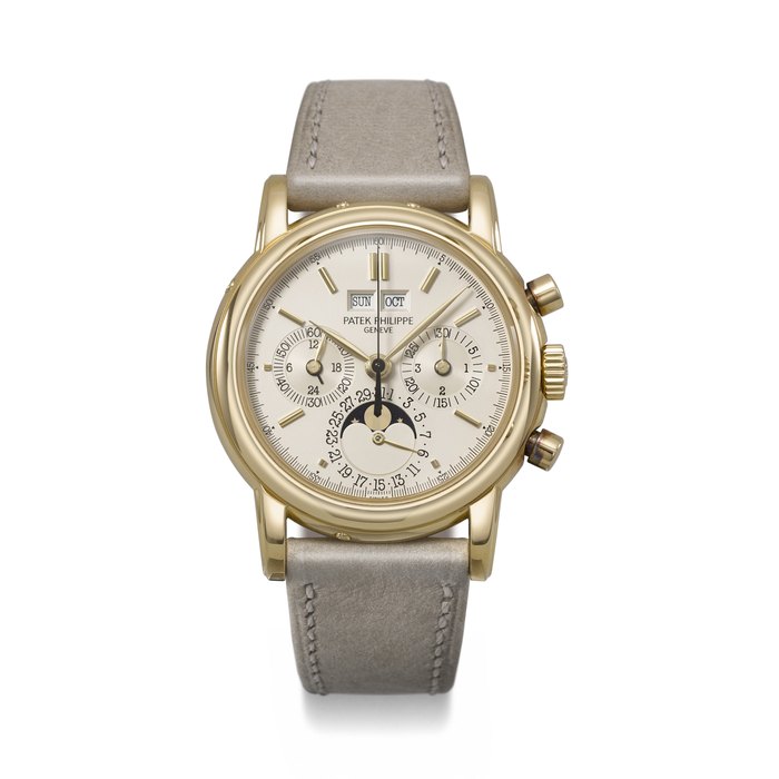 PATEK PHILIPPE. A VERY RARE AND HIGHLY COVETED 18K GOLD PERPETUAL CALENDAR CHRONOGRAPH WRISTWATCH WITH MOON PHASES, 24-HOUR AND LEAP YEAR INDICATION REF. 3970E, MOVEMENT NO. 875'326, CASE NO. 2'851'194, CIRCA 1989