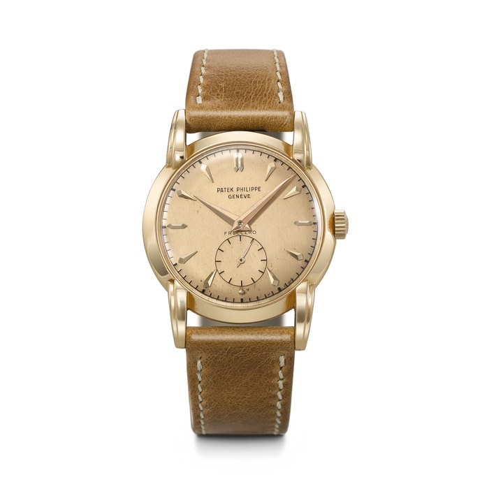 PATEK PHILIPPE. A VERY RARE AND HIGHLY ATTRACTIVE 18K PINK GOLD WRISTWATCH WITH PINK DIAL AND FANCY LUGS RETAILED BY FRECCERO, CALATRAVA MODEL, REF. 2429, MOVEMENT NO. 954'993, CASE NO. 422'247, MANUFACTURED IN 1950