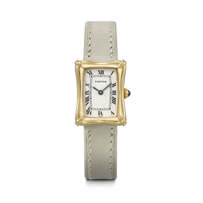 CARTIER. AN EXCEEDINGLY RARE AND UNUSUAL 18K GOLD RECTANGULAR WRISTWATCH COUSSIN BAMBOO MODEL, REF. 78110, NO. 0265, CIRCA 1975