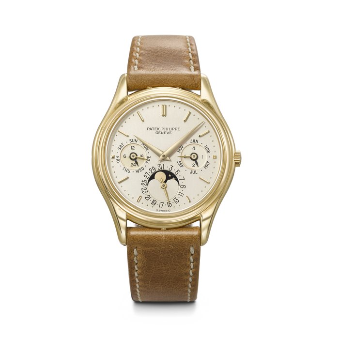 PATEK PHILIPPE. A VERY RARE AND HIGHLY COVETED 18K GOLD AUTOMATIC PERPETUAL CALENDAR WRISTWATCH WITH MOON PHASES, 24-HOUR AND LEAP YEAR INDICATION REF. 3940, MOVEMENT NO. 770'064, CASE NO. 2'823'619, CIRCA 1986
