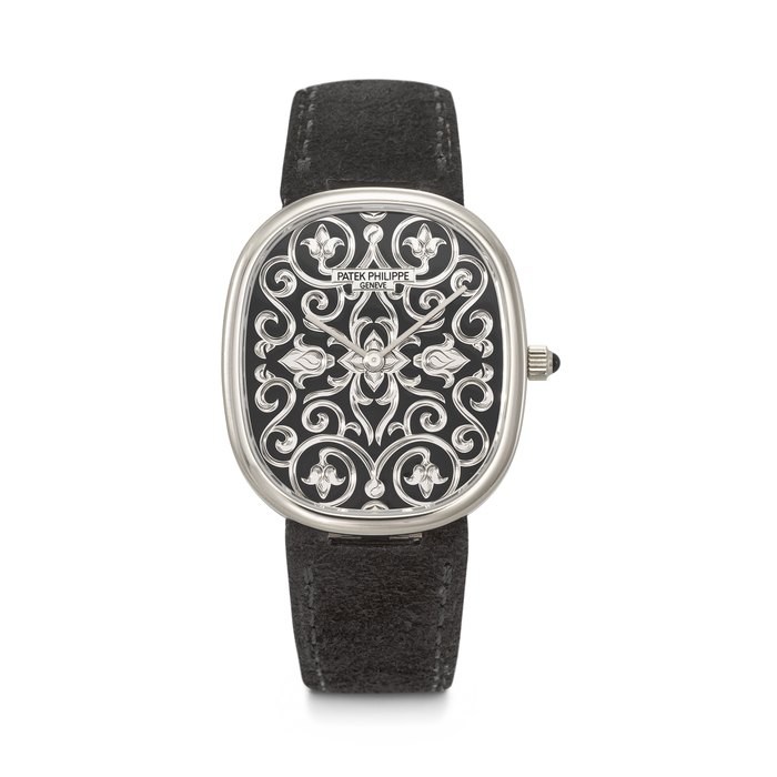 PATEK PHILIPPE. A RARE AND ATTRACTIVE 18K WHITE GOLD AUTOMATIC WRISTWATCH WITH GRAND FEU BLACK ENAMEL HAND ENGRAVED DIAL GOLDEN ELLIPSE MODEL, REF. 5738/51G-001, MOVEMENT NO. 7'447'977, CASE NO. 6'509'830, CIRCA 2021