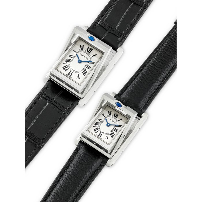 CARTIER. TWO STAINLESS STEEL WRISTWATCHES 1. TANK BASCULANTE MODEL, REF. 2405, CASE NO. 80833PB 2. TANK BASCULANTE MODEL, REF. 2386, CASE NO. 47346CD