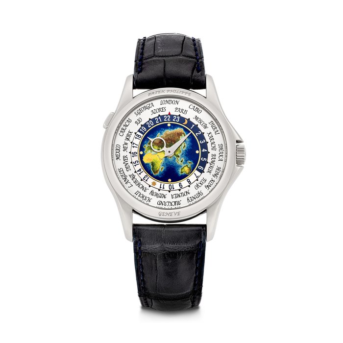 PATEK PHILIPPE. A RARE 18K WHITE GOLD AUTOMATIC WORLD TIME WRISTWATCH WITH CLOISONNÉ ENAMEL DIAL REF. 5131G-001, MOVEMENT NO. 5'530'389, CASE NO. 4'494'573, CIRCA 2010