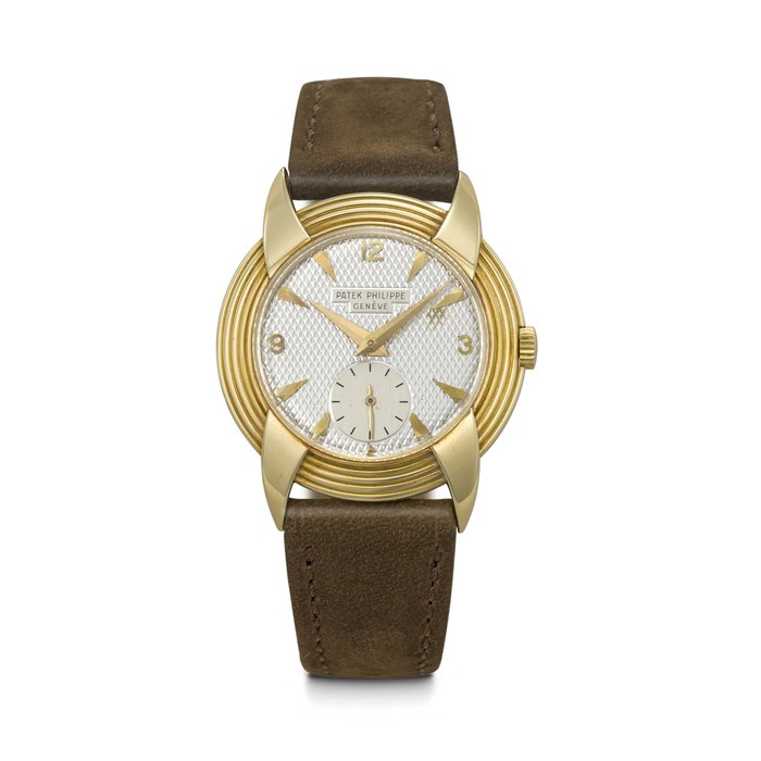PATEK PHILIPPE. A HIGHLY UNUSUAL AND ATTRACTIVE 18K GOLD WRISTWATCH WITH FANCY LUGS REF. 2549, MOVEMENT NO. 742'781, CASE NO. 684'830, MANUFACTURED IN 1954