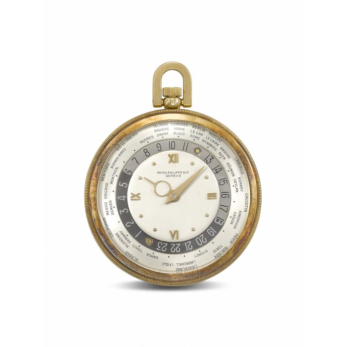 PATEK PHILIPPE. A RARE AND IMPORTANT 18K GOLD OPENFACE KEYLESS LEVER WORLD TIME WATCH REF. 605 HU, MOVEMENT NO. 930'362, CASE NO. 636'401, MANUFACTURED IN 1943