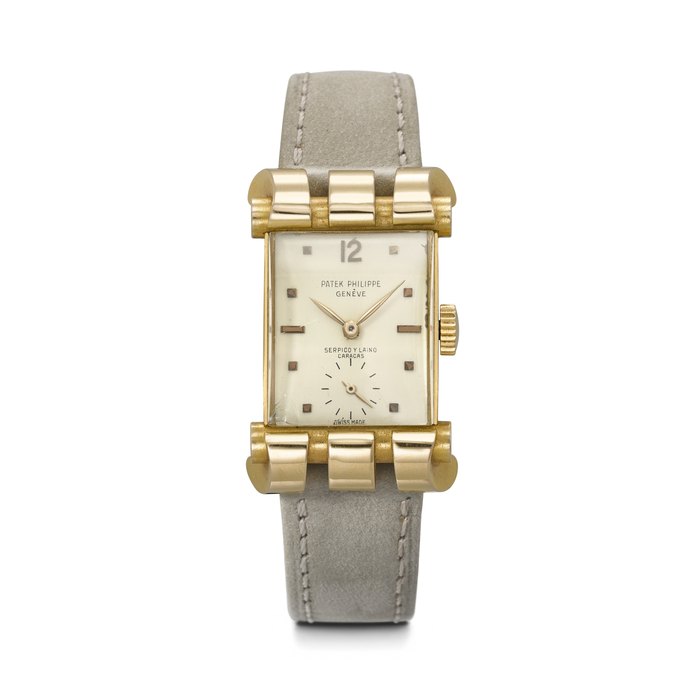 PATEK PHILIPPE. A VERY RARE AND UNUSUAL 18K PINK GOLD RECTANGULAR WRISTWATCH WITH FANCY LUGS RETAILED BY SERPICO Y LAINO, REF. 2471, MOVEMENT NO. 975'165, CASE NO. 672'604, MANUFACTURED IN 1953