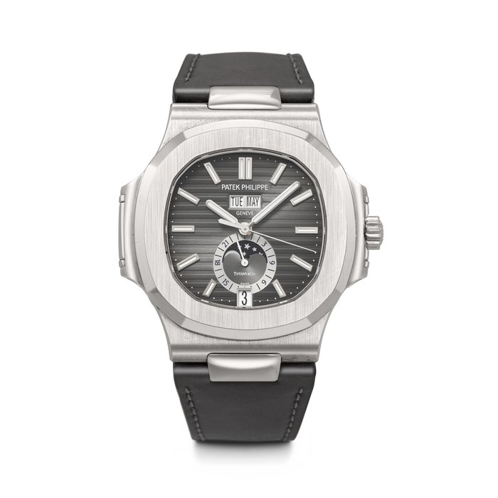 PATEK PHILIPPE. A VERY RARE AND COVETED STAINLESS STEEL AUTOMATIC ANNUAL CALENDAR WRISTWATCH WITH SWEEP CENTRE SECONDS, MOON PHASES AND 24-HOUR INDICATION RETAILED BY TIFFANY & CO., NAUTILUS MODEL, REF. 5726A-001, MOVEMENT NO. 7'049'694, CASE NO. 6'176'518, CIRCA 2017