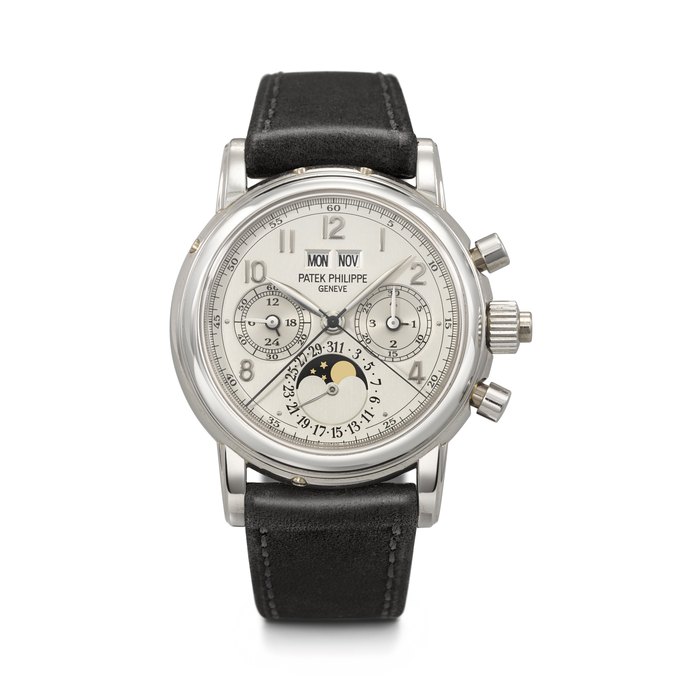 Patek Philippe PATEK PHILIPPE. A VERY RARE AND HIGHLY COVETED PLATINUM PERPETUAL CALENDAR SPLIT SECONDS CHRONOGRAPH WRISTWATCH WITH MOON PHASES, 24-HOUR AND LEAP YEAR INDICATION REF. 5004P, MOVEMENT NO. 879'564, CASE NO. 2'984'921, CIRCA 1997, Price & Market Data