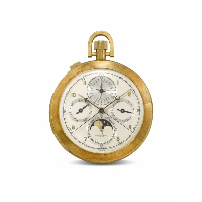 AUDEMARS PIGUET. AN EXTREMELY RARE AND ATTRACTIVE 18K GOLD OPENFACE MINUTE REPEATING PERPETUAL CALENDAR SPLIT SECONDS CHRONOGRAPH KEYLESS LEVER WATCH WITH MOON PHASES AND LEAP YEAR INDICATION GRANDE COMPLICATION MODEL, REF. 5525BR, CASE NO. 26'863, SOLD IN 1955