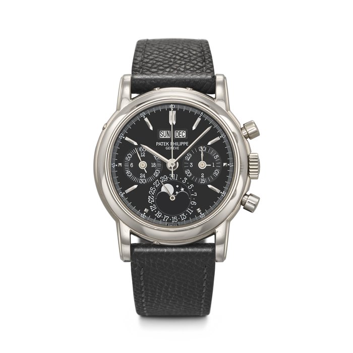 PATEK PHILIPPE. A RARE AND COVETED 18K WHITE GOLD PERPETUAL CALENDAR CHRONOGRAPH WRISTWATCH WITH MOON PHASES, 24-HOUR AND LEAP YEAR INDICATION REF. 3970EG-018, MOVEMENT NO. 3'046'877, CASE NO. 4'103'639, MANUFACTURED IN 2000