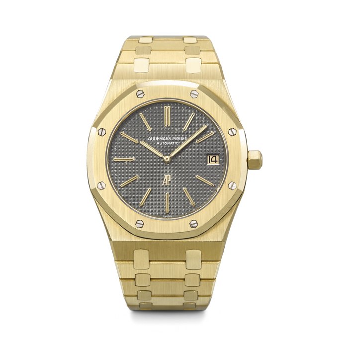 AUDEMARS PIGUET. AN ICONIC AND HIGHLY ATTRACTIVE 18K GOLD AUTOMATIC WRISTWATCH WITH DATE AND BRACELET ROYAL OAK MODEL, REF. 5402BA, NO. 552, CIRCA 1980