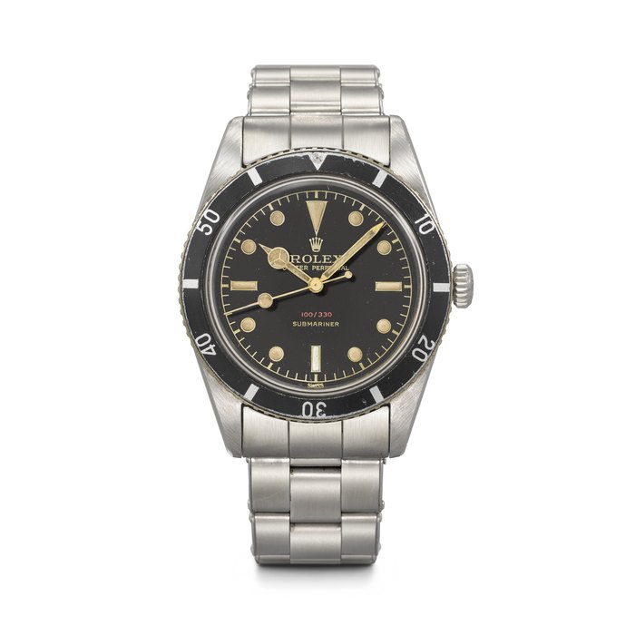 ROLEX. A VERY RARE AND EARLY STAINLESS STEEL AUTOMATIC WRISTWATCH WITH SWEEP CENTRE SECONDS, GLOSSY BLACK 'RED DEPTH' DIAL AND BRACELET SUBMARINER MODEL, REF. 6536⁄8, CASE NO. 89'252, CIRCA 1955