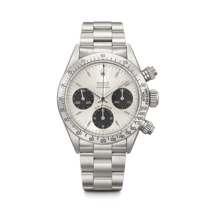 Rolex ROLEX. A RARE AND ICONIC STAINLESS STEEL CHRONOGRAPH WRISTWATCH WITH BRACELET DAYTONA 'BIG RED' MODEL, REF. 6265, CASE NO. 7'426'507, CIRCA 1983 · 6265