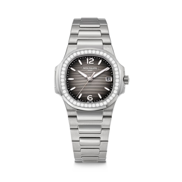 PATEK PHILIPPE. A LADY'S 18K WHITE GOLD AND DIAMOND-SET WRISTWATCH WITH SWEEP CENTRE SECONDS, DATE AND BRACELET NAUTILUS MODEL, REF. 7010/1G-012, MOVEMENT NO. 5'752'992, CASE NO. 4'619'046, CIRCA 2013