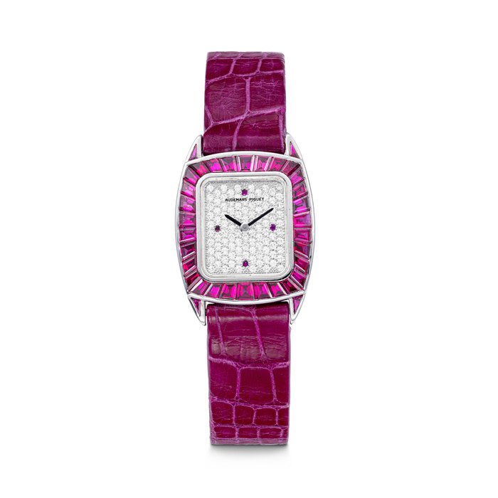 AUDEMARS PIGUET. AN ATTRACTIVE LADY’S 18K WHITE GOLD, DIAMOND AND BAGUETTE-CUT RUBY-SET WRISTWATCH REF. 66625BC, MOVEMENT NO. 388'148, CASE NO. D30186, MANUFACTURED IN 1993