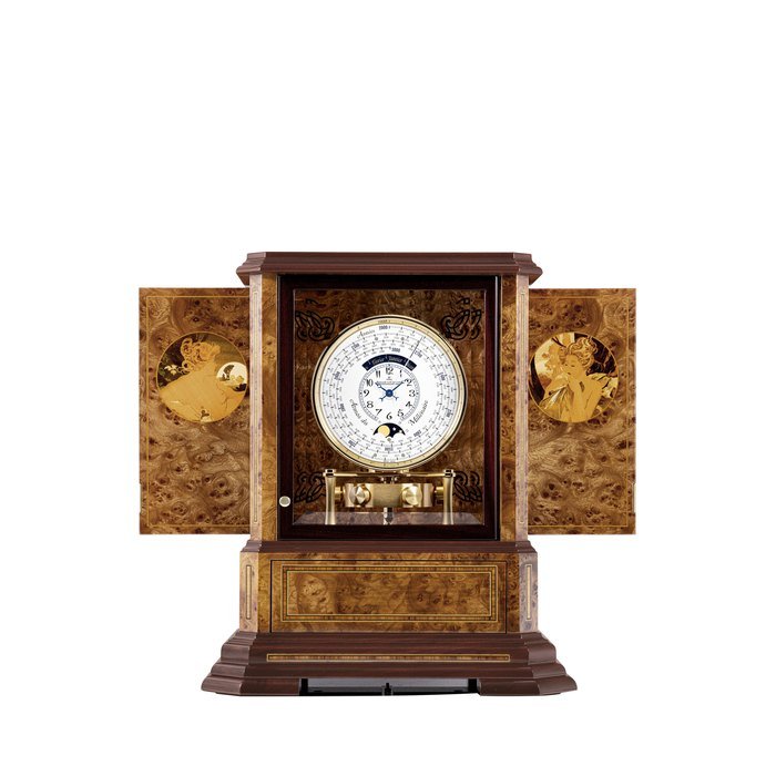 Jaeger-Lecoultre JAEGER-LECOULTRE. A VERY RARE WOOD AND GILT METAL ATMOS CLOCK WITH 1000 YEAR CALENDAR AND MOON PHASES ATMOS DU MILLÉNAIRE MARQUETERIE MODEL, MOVEMENT NO. 696'818, CASE NO. 65