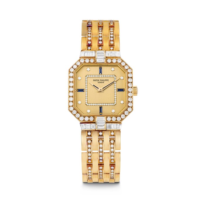 PATEK PHILIPPE. A RARE 18K GOLD, DIAMOND AND SAPPHIRE-SET OCTAGONAL WRISTWATCH WITH BRACELET REF. 3981⁄1, MOVEMENT NO. 1'332'237, CASE NO. 2'855'880, CIRCA 1988