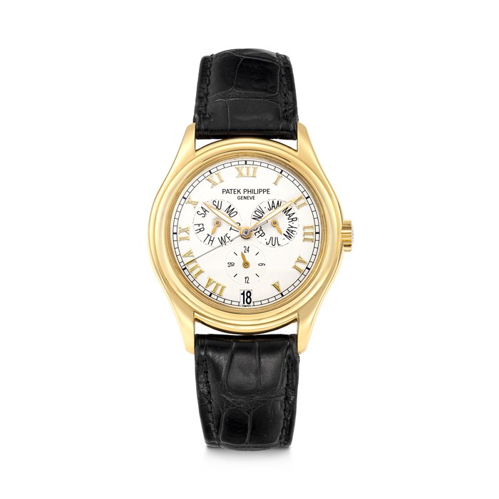 PATEK PHILIPPE. A 18K GOLD AUTOMATIC ANNUAL CALENDAR WRISTWATCH WITH SWEEP CENTRE SECONDS AND 24 HOUR INDICATION REF. 5035J, MOVEMENT NO. 3'056'326, CASE NO. 4'019'328, CIRCA 1997