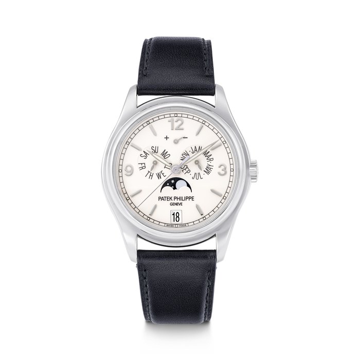 PATEK PHILIPPE. AN 18K WHITE GOLD AUTOMATIC ANNUAL CALENDAR WRISTWATCH WITH SWEEP CENTRE SECONDS, MOON PHASES AND POWER RESERVE REF. 5146G-001, MOVEMENT NO. 3'421'822, CASE NO. 4'306'491, MANUFACTURED IN 2005