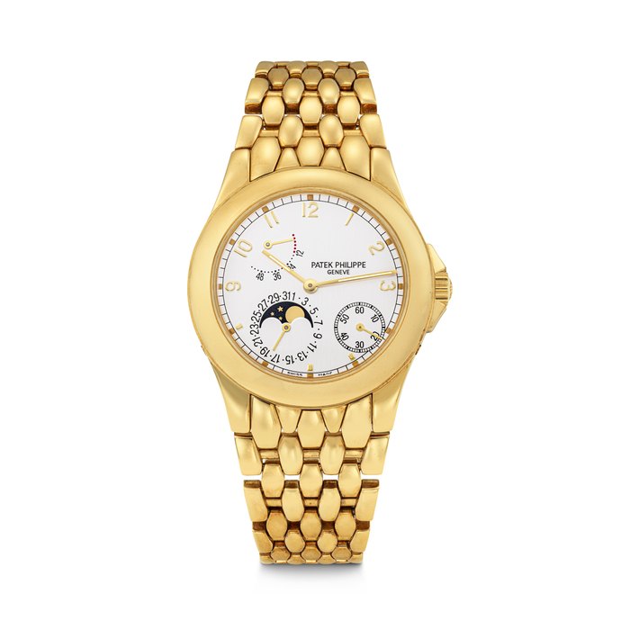 PATEK PHILIPPE. AN 18K GOLD AUTOMATIC WRISTWATCH WITH POWER RESERVE, MOON PHASES, DATE AND BRACELET REF. 5085/1J, MOVEMENT NO. 3'112'139, CASE NO. 4'086'504, MANUFACTURED IN 1999