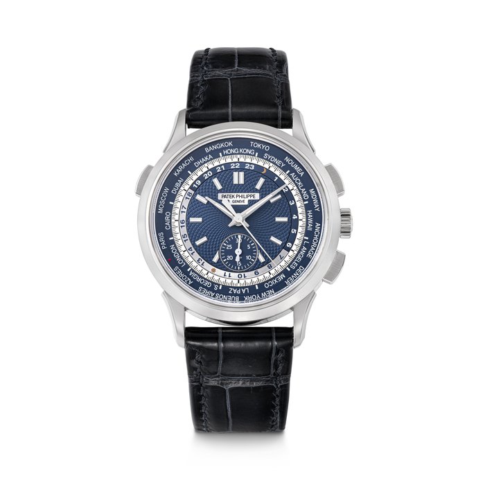 PATEK PHILIPPE. AN 18K WHITE GOLD AUTOMATIC FLYBACK CHRONOGRAPH WRISTWATCH WITH WORLD TIME REF. 5930G-001, MOVEMENT NO. 7'130'731, CASE NO. 6'260'168, CIRCA 2018
