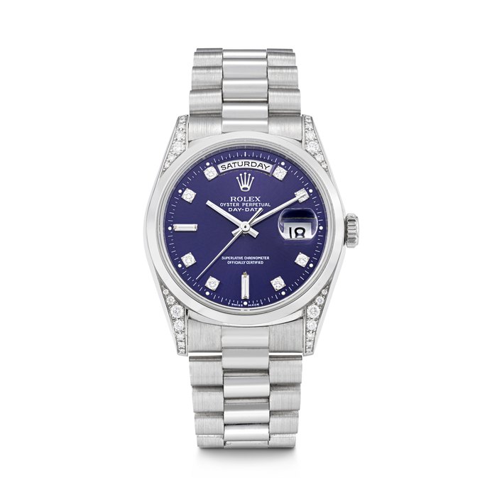 ROLEX. A RARE AND ELEGANT PLATINUM AND DIAMOND-SET AUTOMATIC WRISTWATCH WITH SWEEP CENTRE SECONDS, DAY, DATE AND BRACELET DAY-DATE MODEL, REF. 18296, CASE NO. W006859