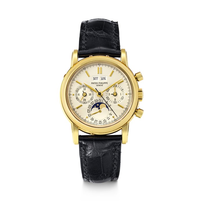 PATEK PHILIPPE. A VERY RARE AND WELL PRESERVED 18K GOLD PERPETUAL CALENDAR CHRONOGRAPH WRISTWATCH WITH MOON PHASES, 24 HOUR, LEAP YEAR INDICATION AND GERMAN CALENDAR REF. 3971E "SECOND SERIES", MOVEMENT NO. 875'394, CASE NO. 2’856’591, CIRCA 1989