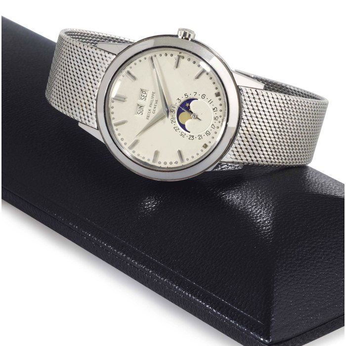 PATEK PHILIPPE. A FINE AND RARE 18K WHITE GOLD AUTOMATIC PERPETUAL CALENDAR WRISTWATCH WITH MOON PHASES AND BRACELET SIGNED PATEK PHILIPPE, GENEVE, MOVEMENT NO. 1119039, CASE NO. 317475, REF. 3448, MANUFACTURED IN 1966