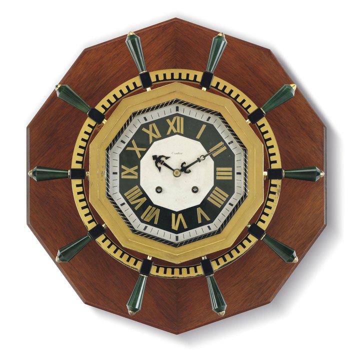 CARTIER. A RARE AND UNUSUAL GILT METAL AND NEPHRITE EIGHT DAY ART DECO SHIP'S BELL STRIKING CLOCK SIGNED CARTIER, FRANCE, MOVEMENT SIGNED CHELSEA CLOCK CO., BOSTON MA., NO. 187131, MOVEMENT PLATE AND BASE PLATE ALSO SIGNED EUROPEAN WATCH AND CLOCK CO., INC, FRANCE, NO. 3643 AND 2017, CIRCA 1929