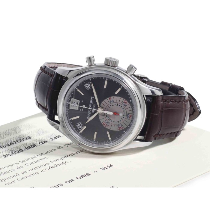 Patek Philippe. A Fine Platinum Automatic Annual Calendar Flyback Chronograph Wristwatch With Power Reserve Indication And Original Certificate SIGNED PATEK PHILIPPE, GENEVE, REF. 5960, MOVEMENT NO. 3'505'610, CASE NO. 4'476'593, CIRCA 2009