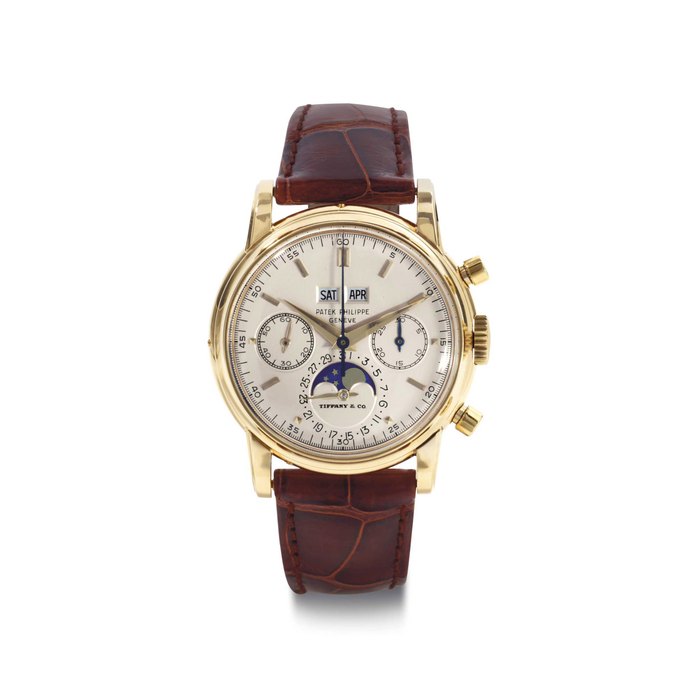 Patek Philippe. An Extremely Fine 18k Gold Perpetual Calendar Chronograph Wristwatch With Moon Phases SIGNED PATEK PHILIPPE, GENEVE, RETAILED BY TIFFANY & CO., REF. 2499, MOVEMENT NO. 869'469, CASE NO. 2'700 427, MANUFACTURED IN 1977