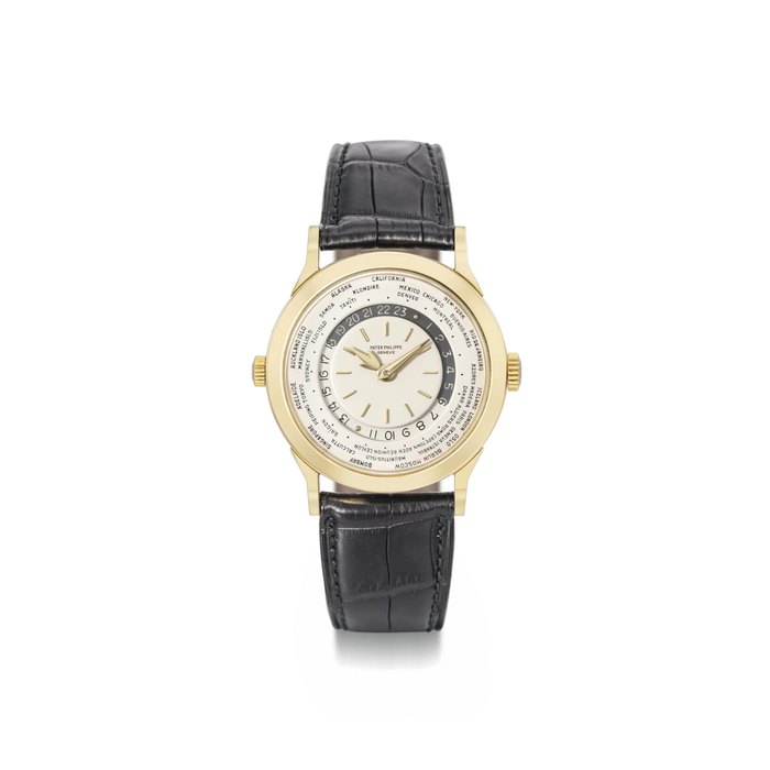 Patek Philippe. A Fine and Rare 18k Gold World-Time Wristwatch with Two Crowns SIGNED PATEK PHILIPPE, REF, 2523/1, MOVEMENT NO. 724'303, CASE NO. 313'037, MANUFACTURED IN 1963