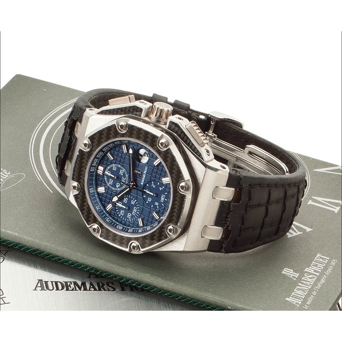 Audemars Piguet. A Large and Heavy Platinum Limited Edition Automatic Chronograph Wristwatch With Date and Carbon Fiber Inserts SIGNED AUDEMARS PIGUET, ROYAL OAK OFFSHORE, LIMITED EDITION, JUAN PABLO MONTOYA, NO. 072/100, REF. 26030, MOVEMENT NO. 582'360, CASE NO. F25321, CIRCA 2004