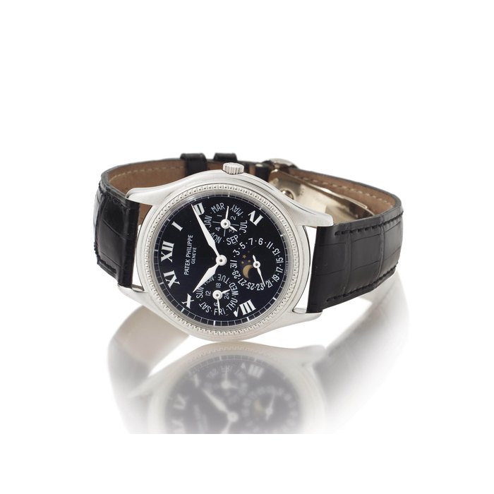 Patek Philippe. A Fine 18k White Gold Automatic Perpetual Calendar Wristwatch with Moonphases SIGNED PATEK PHILIPPE, GENEVE, REF. 5038, MOVEMENT NO. 776'164, CASE NO. 4'008'336, MANUFACTURED IN 1997
