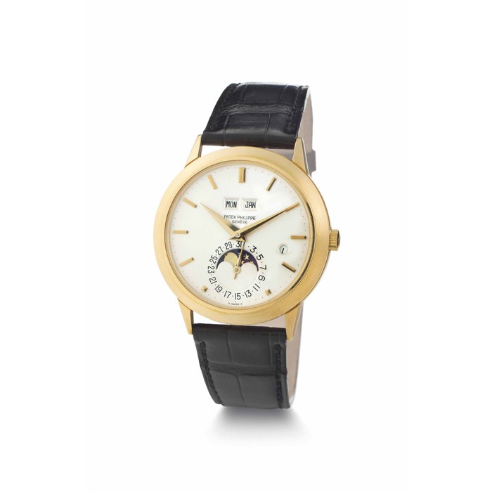 Patek Philippe. A Very Fine and Rare 18k Gold Automatic Perpetual Calendar Wristwatch with Moon Phases and Roman Leap Year Indicator SIGNED PATEK PHILIPPE, GENEVE, REF. 3450, MOVEMENT NO. 1'119'674, CASE NO. 558'595, MANUFACTURED IN 1983