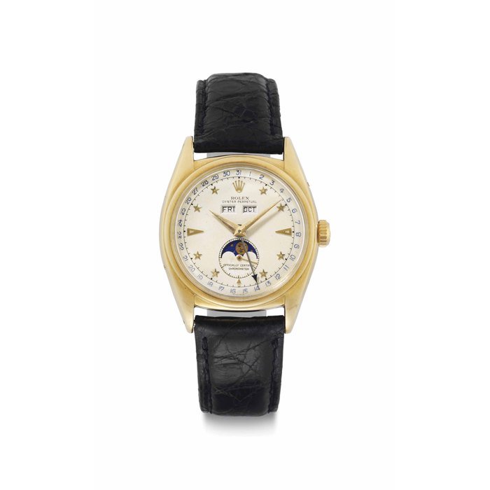 Rolex Rolex. An Extremely Fine and Rare 18k Gold Automatic Triple Calendar Wristwatch with Star Dial and Moon Phases SIGNED ROLEX, OYSTER PERPETUAL, REF. 6062, CASE NO. 911'104, MANUFACTURED IN 1952 · 6062