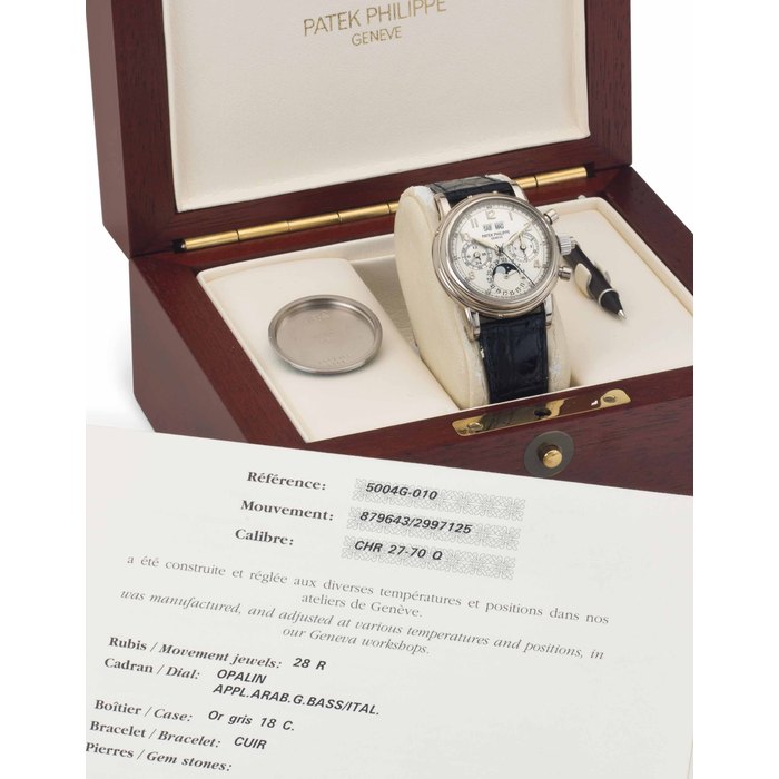 Patek Philippe. A Fine and Rare 18k White Gold Perpetual Calendar Split-Seconds Chronograph Wristwatch with Moon Phases, and Additional Hard Back SIGNED PATEK PHILIPPE, GENEVE, REF. 5004, MOVEMENT NO. 879'643, CASE NO. 2'997'125, MANUFACTURED IN 1997
