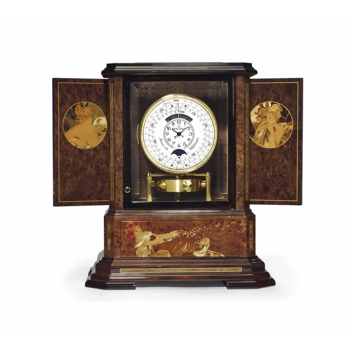 Jaeger-Lecoultre Jaeger-LeCoultre. An Exceptional Limited Edition Wood, Glass and Gilt Barometric Driven Clock with 1000 Year Calendar In The Art Nouveau Style with Original Leather and Brass Bound Fitted Trunk SIGNED JAEGER-LECOULTRE, NO. 13/25, ATMOS MILLÉNAIRE MARQUETERIE AUROR/AE MODEL, CASE SIGNED PHILIPPE MONTI AND JEROME BOUTTECON, MANUFACTURED IN 1999