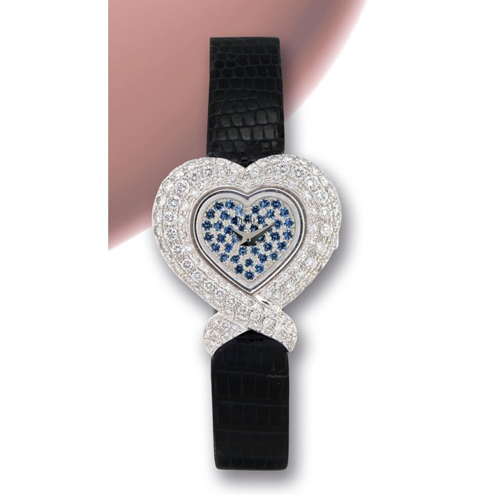 PIAGET LADY'S WHITE GOLD, DIAMOND AND SAPPHIRE-SET QUARTZ WRISTWATCH NO. 5285 815535, CIRCA 2000