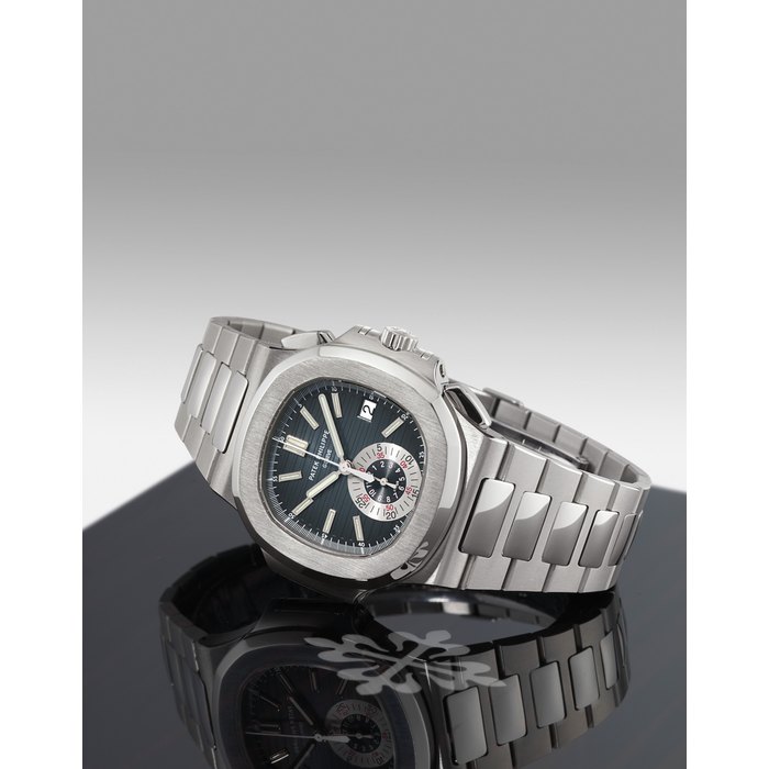 PATEK PHILIPPE, NAUTILUS, REF. 5980/1A STAINLESS STEEL AUTOMATIC CHRONOGRAPH WRISTWATCH WITH DATE DISPLAY AND BRACELET MOVEMENT 4041563, CIRCA 2007