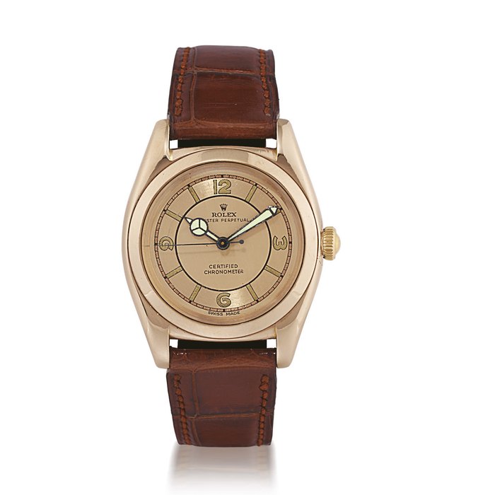 ROLEX, OYSTER PERPETUAL CHRONOMETRE, BUBBLE BACK REF. 3131 PINK GOLD AUTOMATIC WRISTWATCH CASE 550101, CIRCA 1948