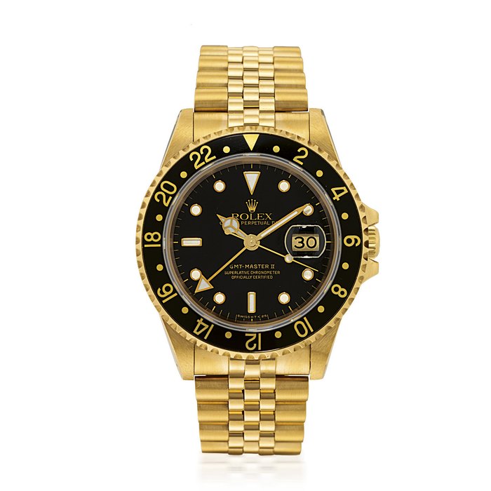 ROLEX, GMT MASTER II, REF. 16718 YELLOW GOLD AUTOMATIC WRISTWATCH WITH DUAL TIME ZONE, DATE AND BRACELET CASE L655478, CIRCA 1990