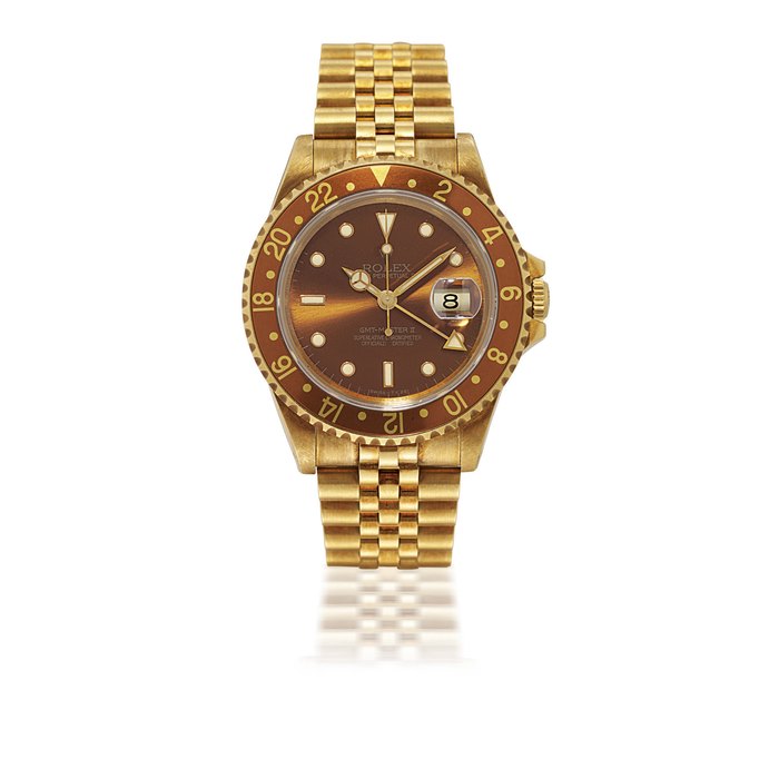 ROLEX, GMT-MASTER II, REF. 16718 YELLOW GOLD AUTOMATIC DUAL-TIME WRISTWATCH WITH DATE DISPLAY AND BRACELET CASE E427572, CIRCA 1990