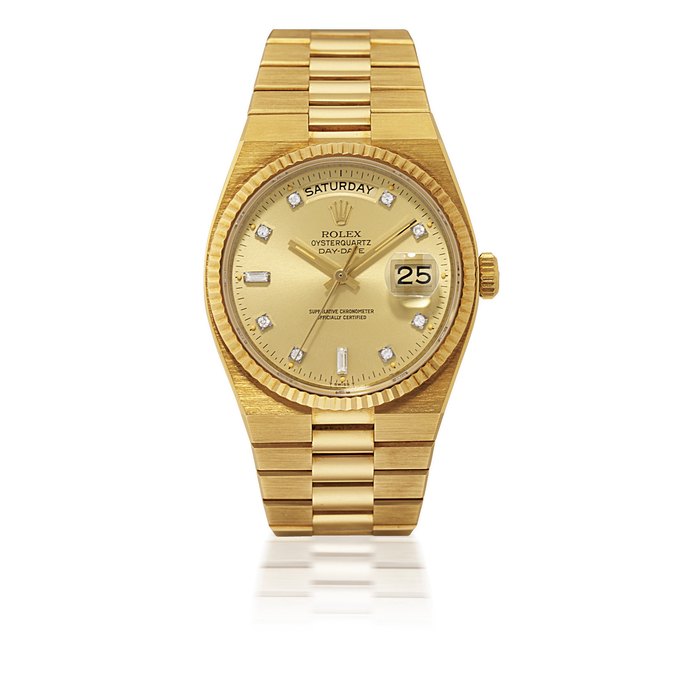 ROLEX, OYSTERQUARTZ DAY-DATE, REF. 19018 YELLOW GOLD QUARTZ WRISTWATCH WITH DAY, DATE, DIAMOND-SET MARKERS AND BRACELET CASE 6560607, CIRCA 1980