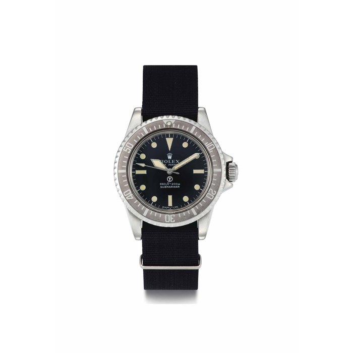 Rolex. A Rare Stainless Steel Automatic Wristwatch with Center Seconds, Hack Feature, and Military Markings, Made for the British Royal Navy SIGNED ROLEX, OYSTER PERPETUAL, 660FT=200M, SUBMARINER, REF. 5513, CASE NO. 3'826'499, CIRCA 1972